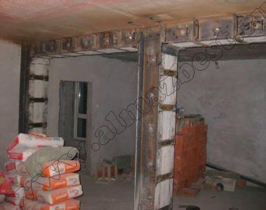Opening in the load-bearing wall according to the project in panel, monolithic and brick houses